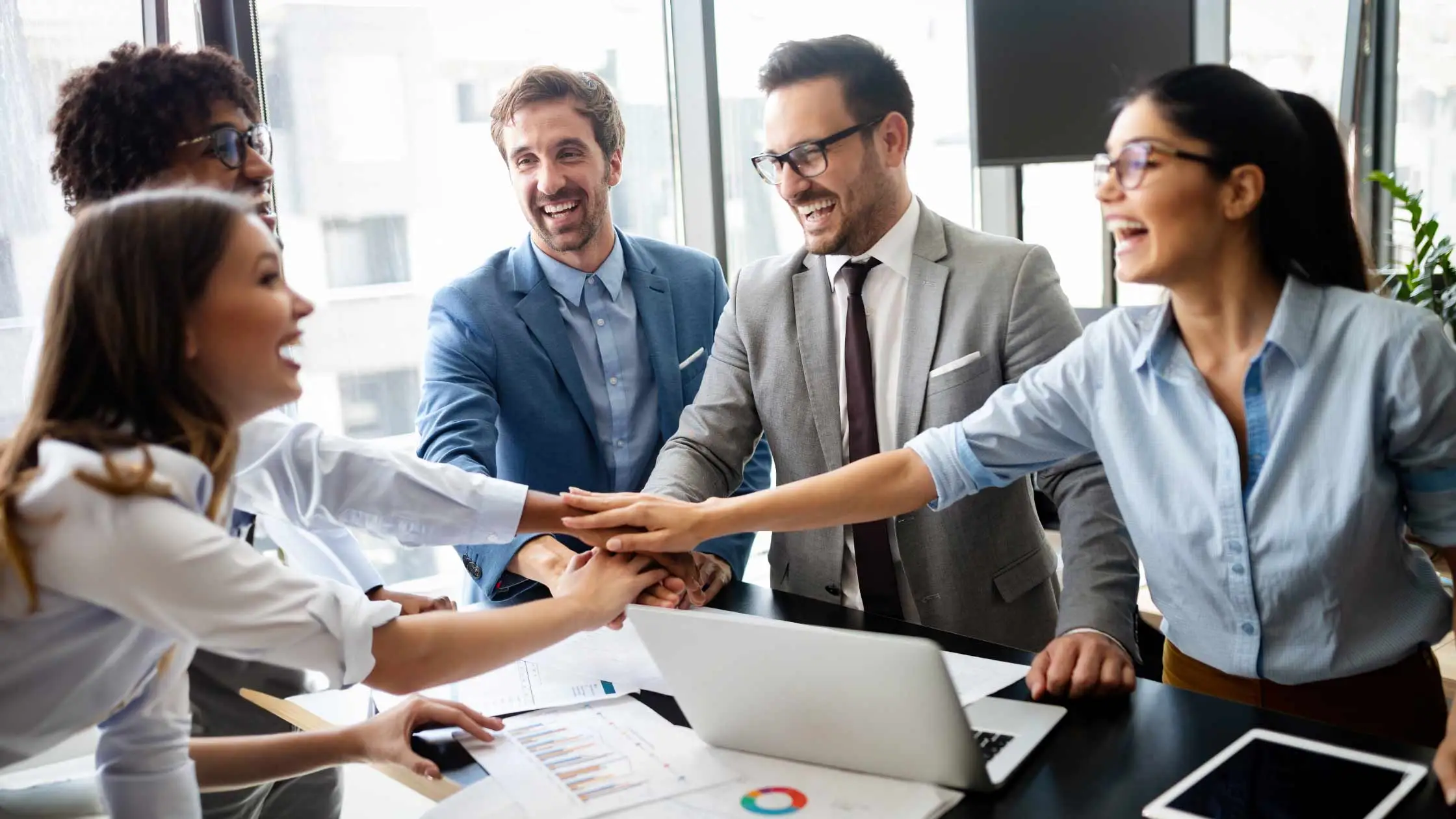 A team happily meeting for networking contractor SEO.